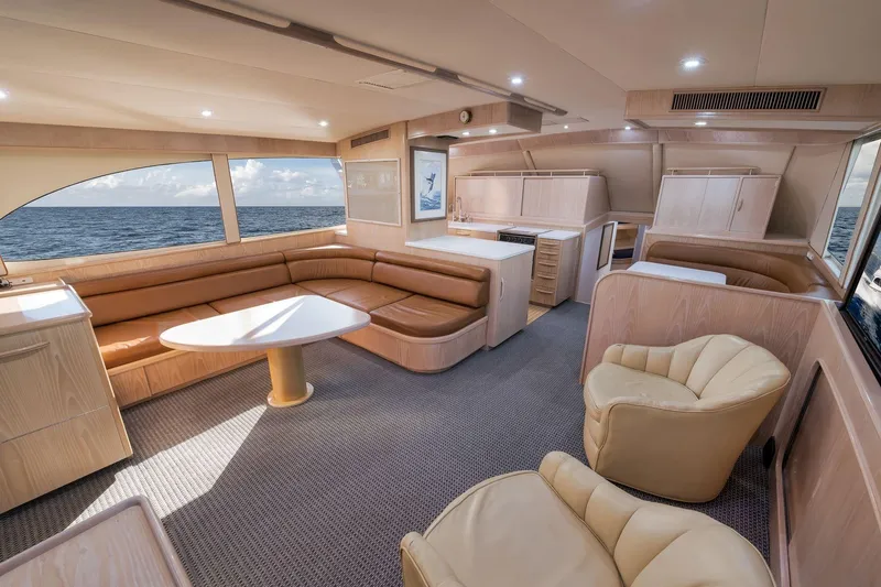 Slide: The Image of Luxurious interior of a 1998 Rybovich Convertible yacht with ocean view. - 1