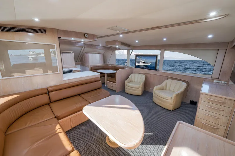 Slide: The Image of Luxurious interior of a 1998 Rybovich Convertible yacht with ocean view. - 2