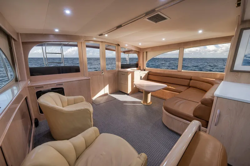 Slide: The Image of Luxurious interior of a 1998 Rybovich Convertible yacht with ocean view. - 4
