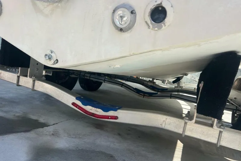 Slide: The Image of Yamaha four-stroke engine on 2021 Sportsman Open 232 Center Console boat. - 20