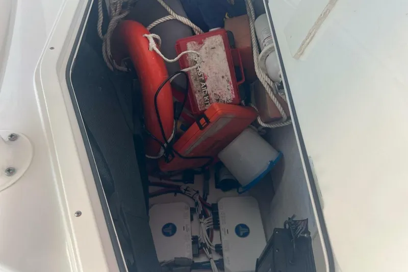 Slide: The Image of 2021 Sportsman Open 232 Center Console boat on trailer, viewed from below. - 28