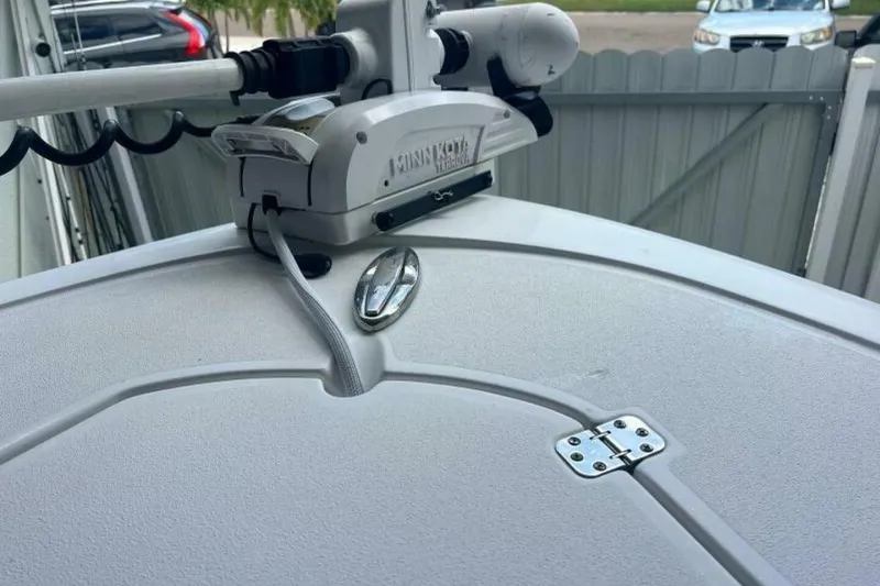 Slide: The Image of Steering wheel of 2021 Sportsman Open 232 Center Console boat, featuring control panel. - 36