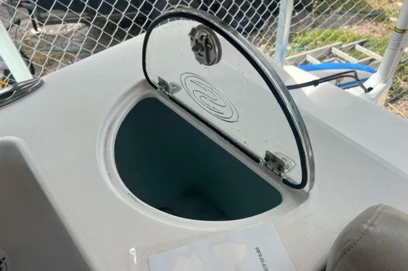 Slide: The Image of Close-up of 2021 Sportsman Open 232 Center Console boat part with "Blade" logo. - 47