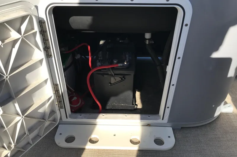 Slide: The Image of 2023 Avalon LSZ Rear Fish battery compartment with visible wiring and components. - 10