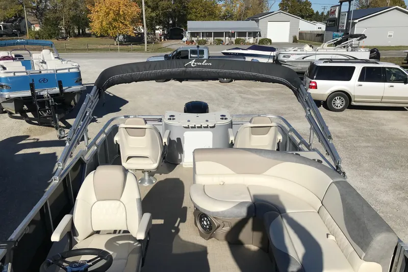 Slide: The Image of 2023 Avalon LSZ Rear Fish pontoon boat with spacious seating and modern design. - 22