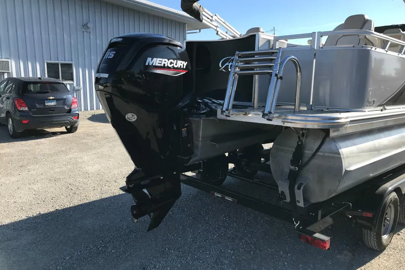 Slide: The Image of 2023 Avalon LSZ Rear Fish pontoon boat with Mercury 115 outboard motor. - 4