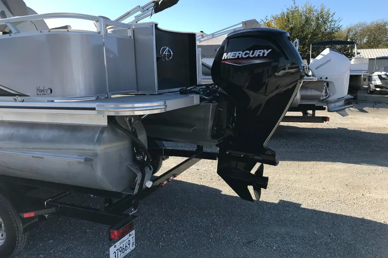 Slide: The Image of 2023 Avalon LSZ Rear Fish pontoon boat with Mercury outboard motor. - 5
