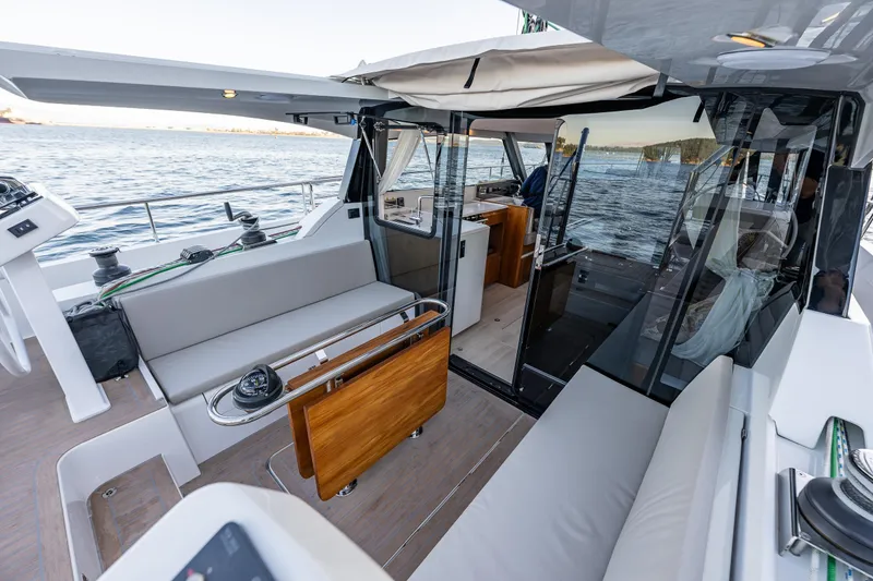 Slide: The Image of Luxurious 2024 Moody 41ds yacht interior with spacious seating and ocean view. - 11