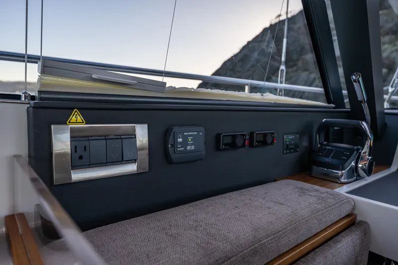 Slide: The Image of Control panel and seating area on 2024 Moody 41ds yacht. - 20