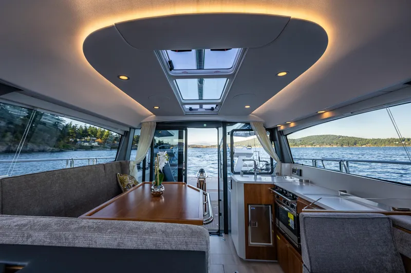 Slide: The Image of Luxurious interior of 2024 Moody 41DS yacht with panoramic windows and modern amenities. - 22