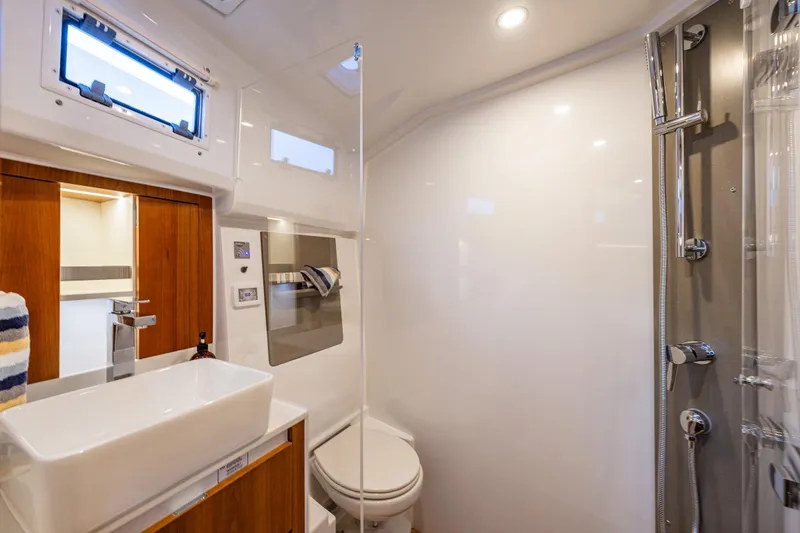 Slide: The Image of Luxurious bathroom in 2024 Moody 41ds yacht, featuring modern fixtures and elegant design. - 26
