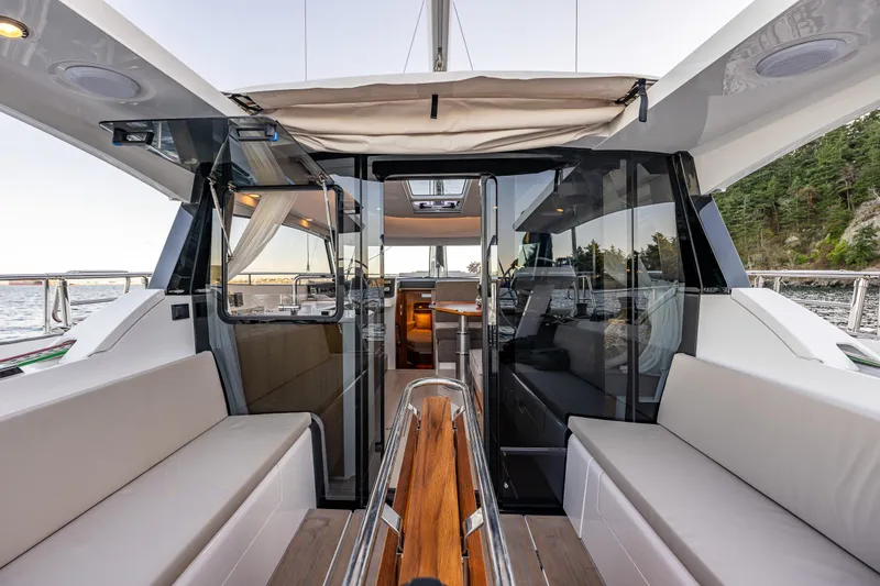 Slide: The Image of Luxurious 2024 Moody 41ds yacht interior with sleek design and comfortable seating. - 9