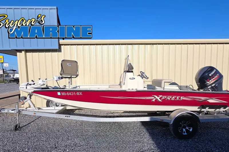 Slide: The Image of 2016 Xpress H20B Bay boat on trailer at Bryan's Marine dealership. - 1