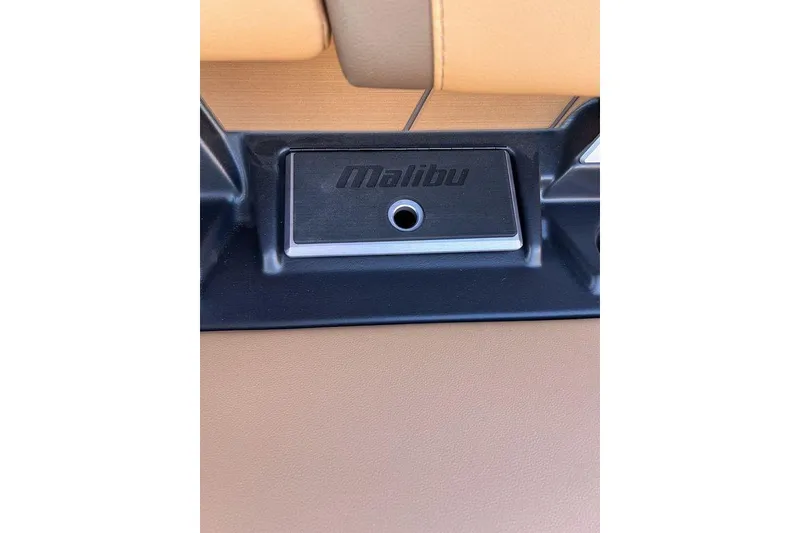 Slide: The Image of 2026 Malibu Sunscape 25 LSV interior detail with logo and sleek design elements. - 15