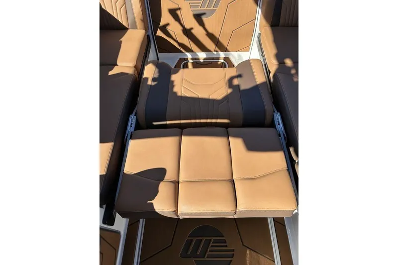 Slide: The Image of Luxurious tan seating on 2026 Malibu Sunscape 25 LSV boat interior. - 16