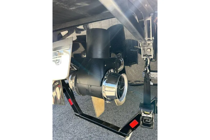 Slide: The Image of 2026 Malibu Sunscape 25 LSV boat propeller and exhaust system close-up. - 8