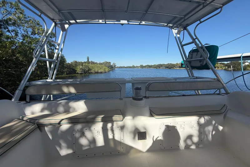 Slide: The Image of 1995 Manta Sailing Catamaran cockpit with scenic river view and clear blue sky. - 21