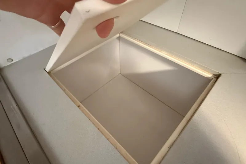 Slide: The Image of Open storage compartment on 1995 Manta SAILING CATAMARAN, showcasing interior space. - 67