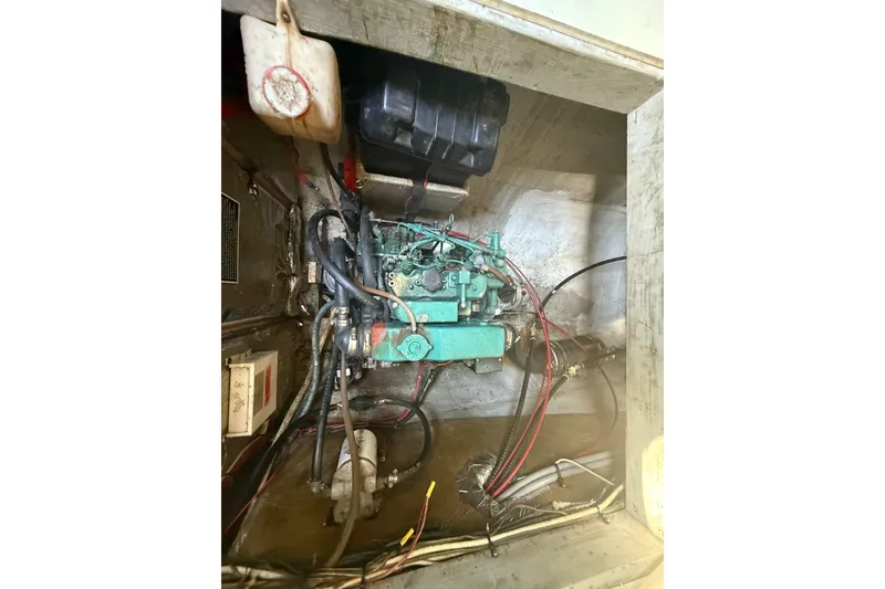 Slide: The Image of Engine compartment of a 1995 Manta SAILING CATAMARAN, showing wiring and components. - 72