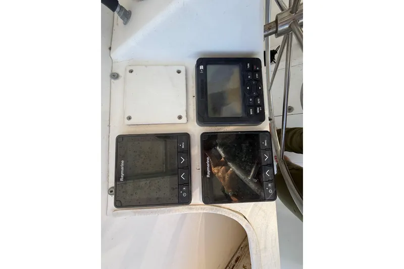 Slide: The Image of Control panel of 1995 Manta SAILING CATAMARAN with navigation instruments. - 80