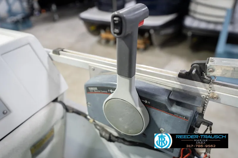 Slide: The Image of Close-up of a Yamaha remote control lever on a 1993 Avalon Playbouy Challenger boat. - 33