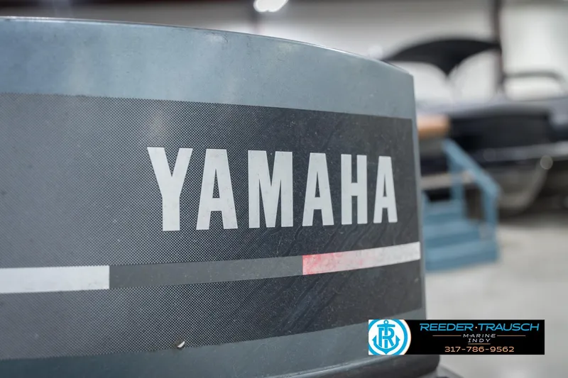 Slide: The Image of Close-up of Yamaha engine on 1993 Avalon Playbouy Challenger boat. - 41