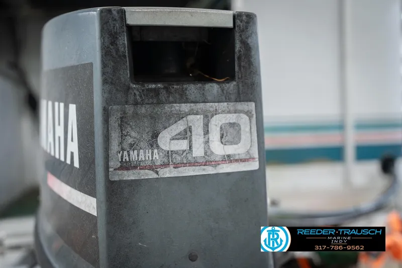 Slide: The Image of Outboard motor on 1993 Avalon Playbouy Challenger, featuring Yamaha 40 branding. - 42