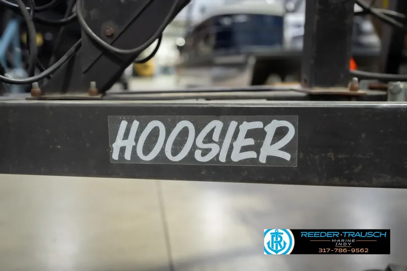 Slide: The Image of 1993 Avalon Playbouy Challenger trailer with "Hoosier" label, Reeder-Trausch Marine logo visible. - 46