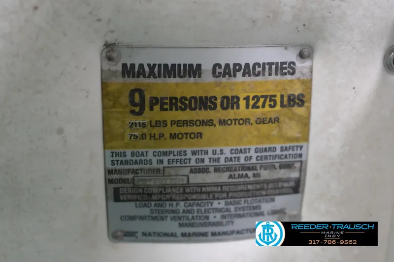Slide: The Image of 1993 Avalon Playbouy Challenger capacity plate, 9 persons or 1275 lbs, 75 HP motor. - 51