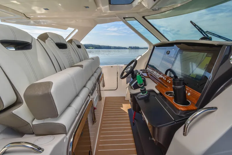 Slide: The Image of Luxurious interior of 2024 Tiara Yachts 38 LS with modern helm and seating. - 22
