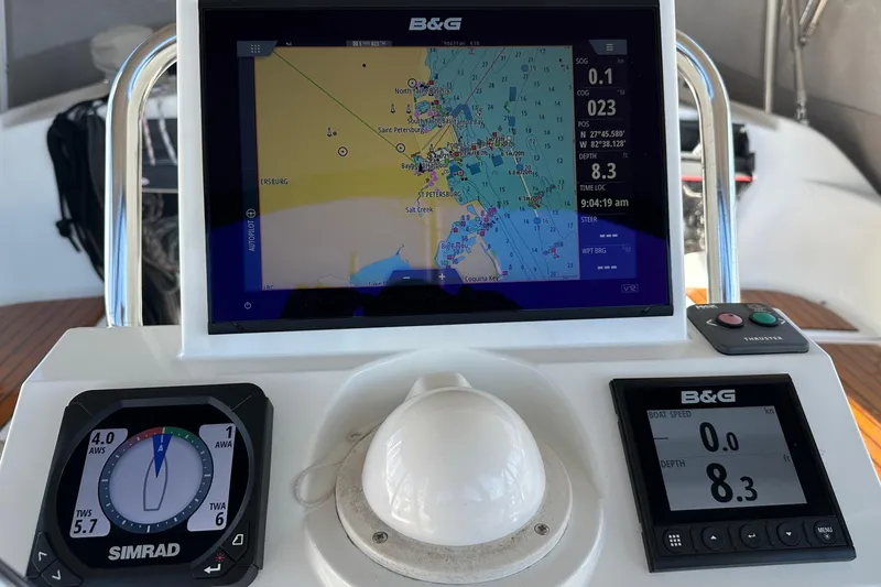 Slide: The Image of Navigation system on 2013 Beneteau Oceanis 37 sailboat, displaying maps and sailing data. - 21
