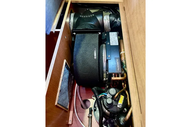Slide: The Image of Engine compartment of 2013 Beneteau Oceanis 37 sailboat with Dometic equipment. - 33