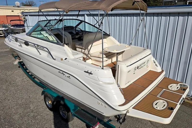 Slide: The Image of Alpine UTE-73BT stereo in 1999 Sea Ray 270 Sundancer boat dashboard. - 13