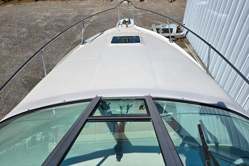 Slide: The Image of 1999 Sea Ray 270 Sundancer boat propeller and drive system close-up. - 20