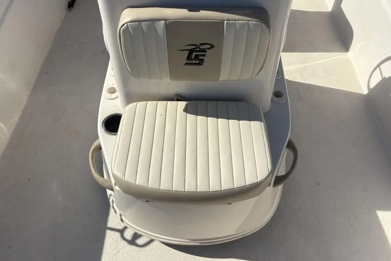 Slide: The Image of 2017 Carolina Skiff 198 DLV boat seat with cup holders and logo. - 13