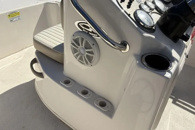Slide: The Image of 2017 Carolina Skiff 198 DLV boat console with speaker and cup holders. - 15