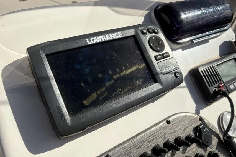 Slide: The Image of Lowrance fishfinder on 2017 Carolina Skiff 198 DLV boat dashboard. - 18