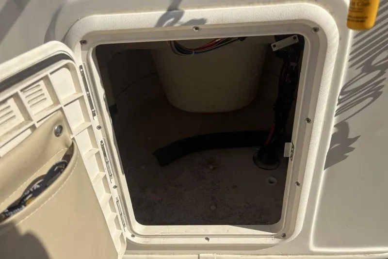 Slide: The Image of Open storage compartment on a 2017 Carolina Skiff 198 DLV boat. - 23