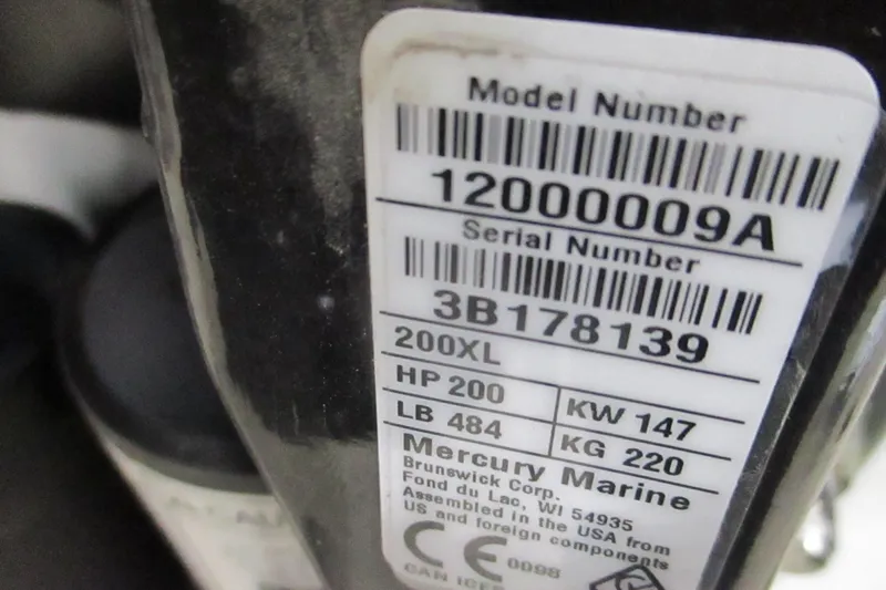 Slide: The Image of Label on Mercury Marine engine, model 200XL, with specifications and serial number. Tahoe T21, 2025. - 10