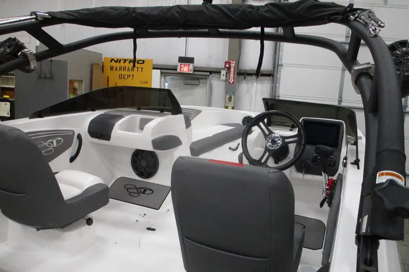 Slide: The Image of Interior of 2025 Tahoe T21 boat with modern steering and seating. - 5