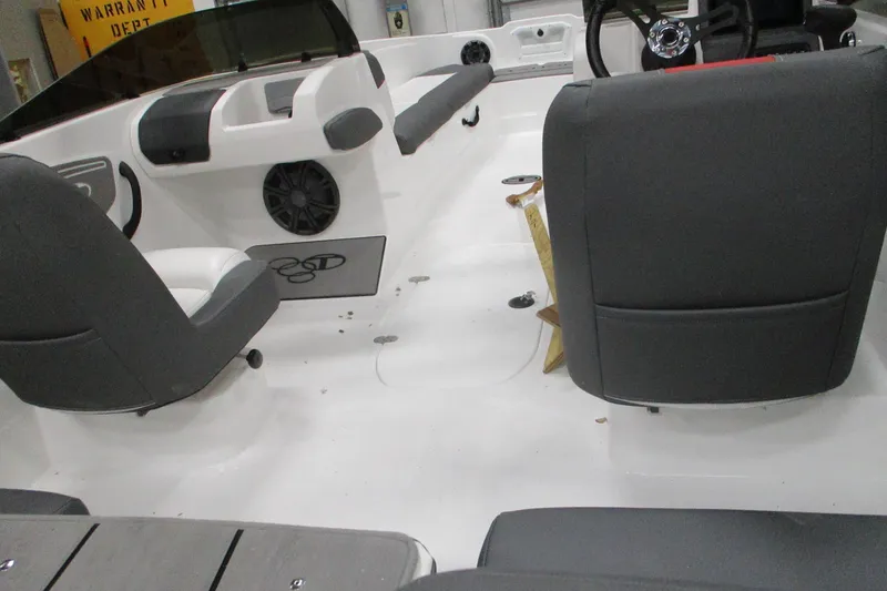 Slide: The Image of Interior of 2025 Tahoe T21 boat with gray seating and modern dashboard. - 6