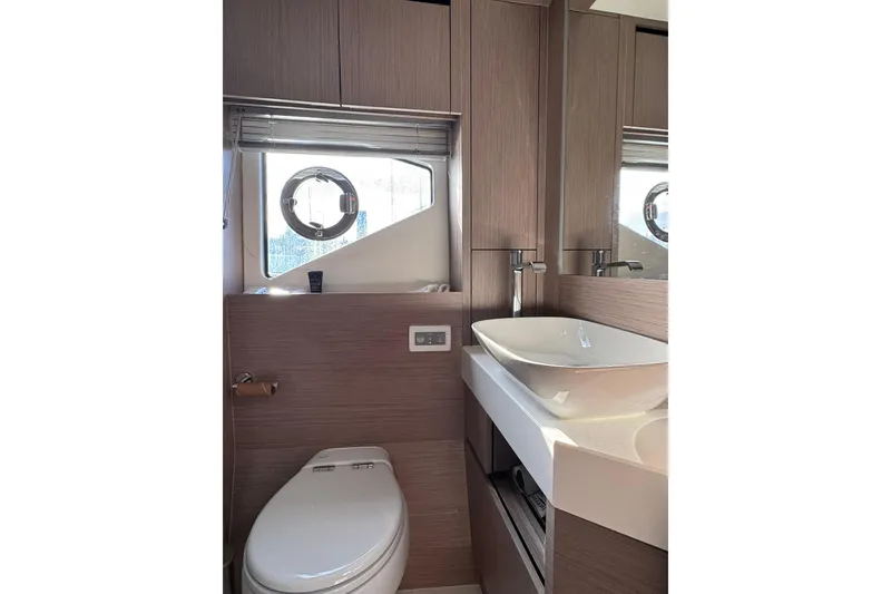 Slide: The Image of Luxurious bathroom interior of 2022 Sunseeker Manhattan 55 yacht, featuring modern fixtures. - 17
