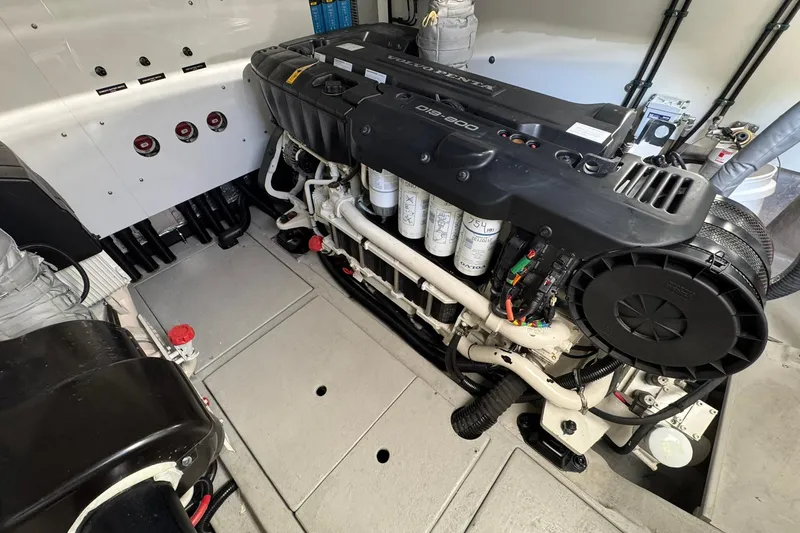 Slide: The Image of Engine room of 2022 Sunseeker Manhattan 55 yacht, featuring a Volvo Penta engine. - 26