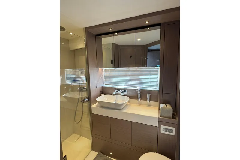 Slide: The Image of Luxurious bathroom in 2022 Sunseeker Manhattan 55 yacht with modern fixtures and elegant design. - 28