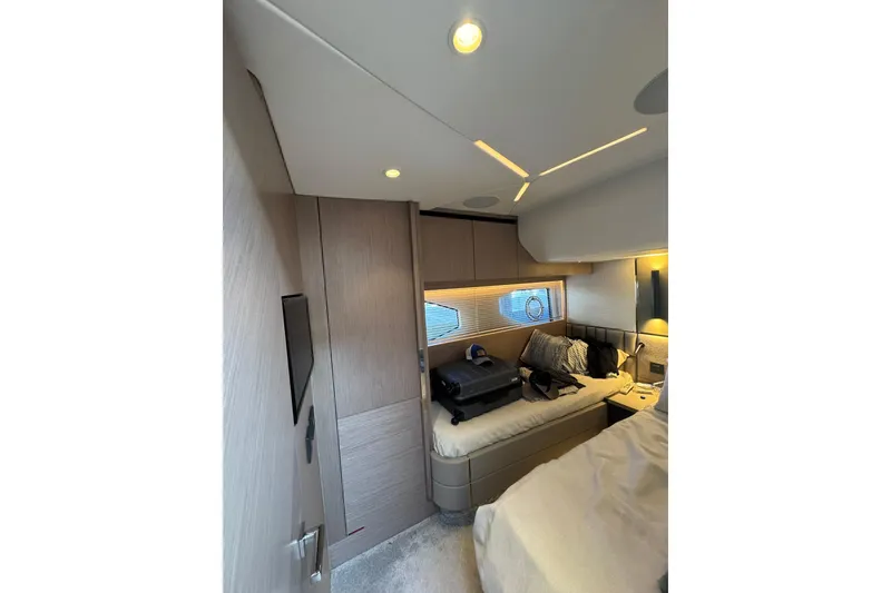 Slide: The Image of Luxurious interior of 2022 Sunseeker Manhattan 55 yacht cabin with modern design. - 29