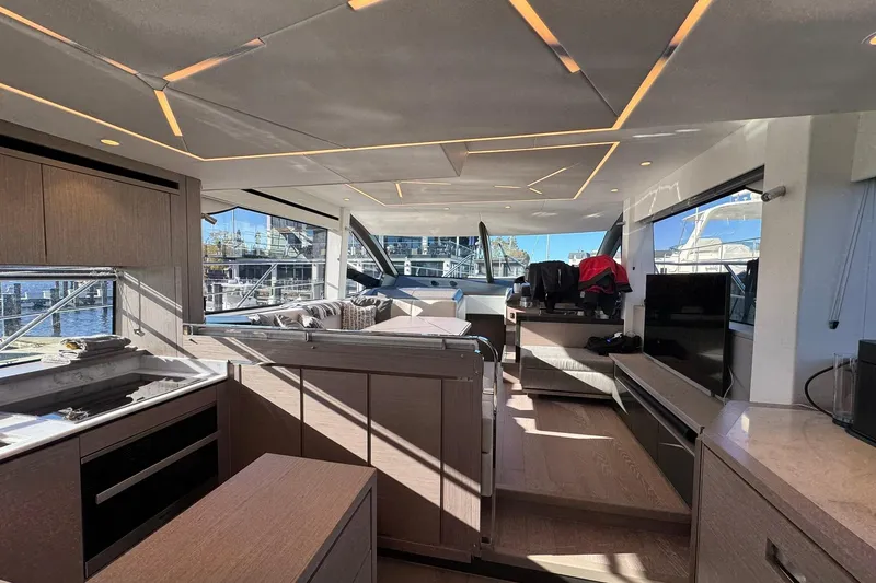 Slide: The Image of Luxurious interior of 2022 Sunseeker Manhattan 55 yacht with modern design and ample natural light. - 30