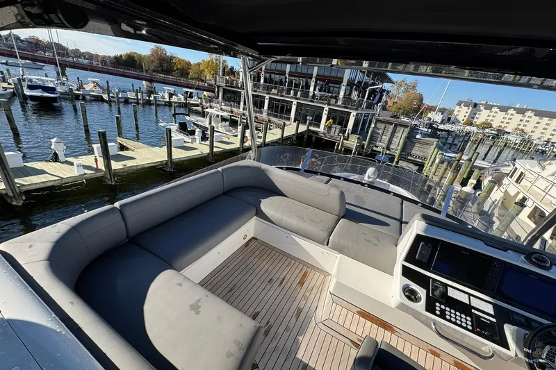 Slide: The Image of Luxurious 2022 Sunseeker Manhattan 55 yacht interior at a marina dock. - 5