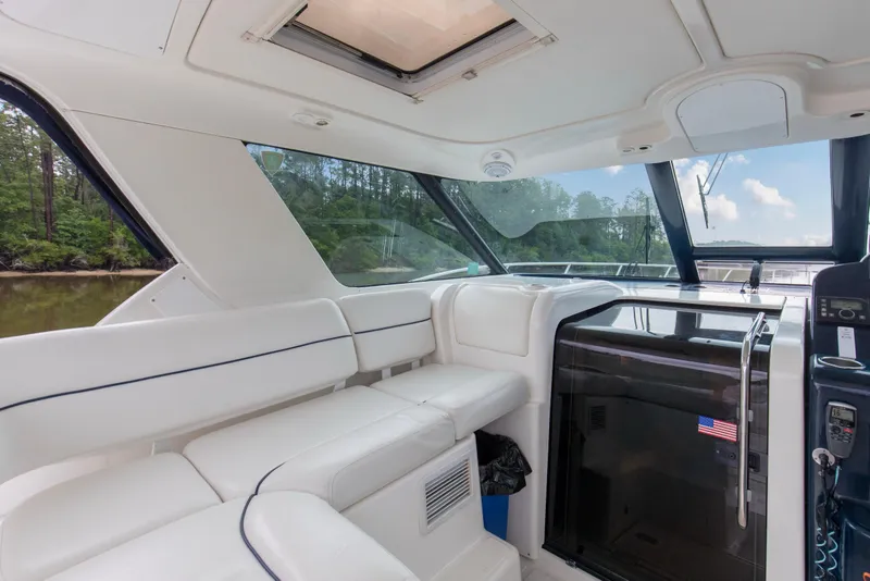Slide: The Image of Interior of 2005 Tiara Yachts 3600 Sovran, featuring white seating and sleek design. - 20