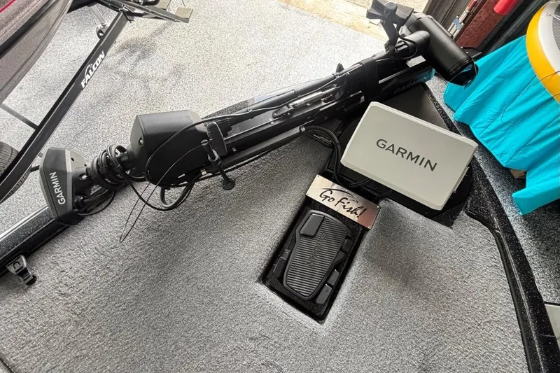 Slide: The Image of 2025 Falcon Boats 21 Predator with Garmin equipment and Go Fish pedal on deck. - 26