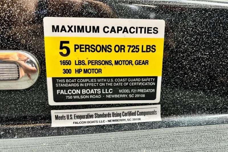 Slide: The Image of 2025 Falcon Boats 21 Predator capacity label, 5 persons or 725 lbs, 300 HP motor. - 28